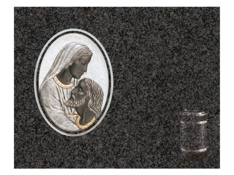 Lápida de nicho Ref. 5090 en granito Sudáfrica con Piedad tallada